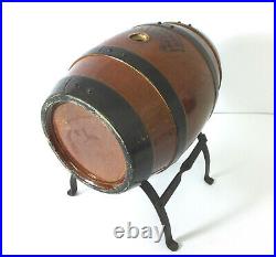 19th. C Doulton Lambeth salt glazed stoneware whiskey barrel on a metal stand