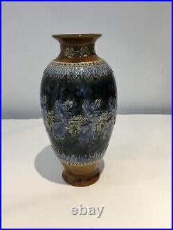 A Doulton Lambeth Vase with applied flower head design by EMILY PARTINGTON 1898
