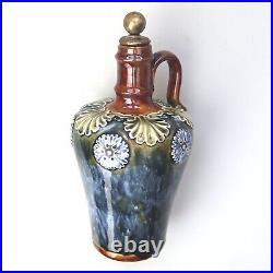 An antique Art Nouveau Royal Doulton pottery advertiser Whiskey Flask C. 19thC