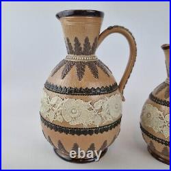 Antique Pair Graduated Doulton Lambeth Stoneware Jugs Decorated Flowers 19cm