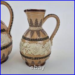 Antique Pair Graduated Doulton Lambeth Stoneware Jugs Decorated Flowers 19cm