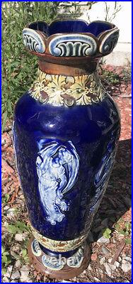 DOULTON LAMBETH FIGURAL TALL VASE IN BLUE AND BROWN CIRCA 1890s