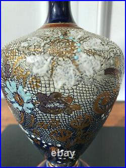 Decorative Doulton Lambeth stoneware vase, numbered 9065 to the base