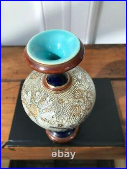 Decorative Doulton Lambeth stoneware vase, numbered 9065 to the base