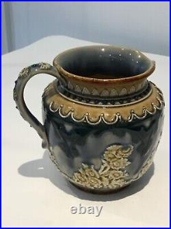 Doulton Lambeth Stoneware jug applied decorations of floral sprigs by A. Sayers