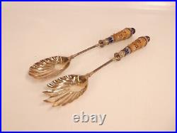 Pair of Doulton Lambeth silver plated salad servers